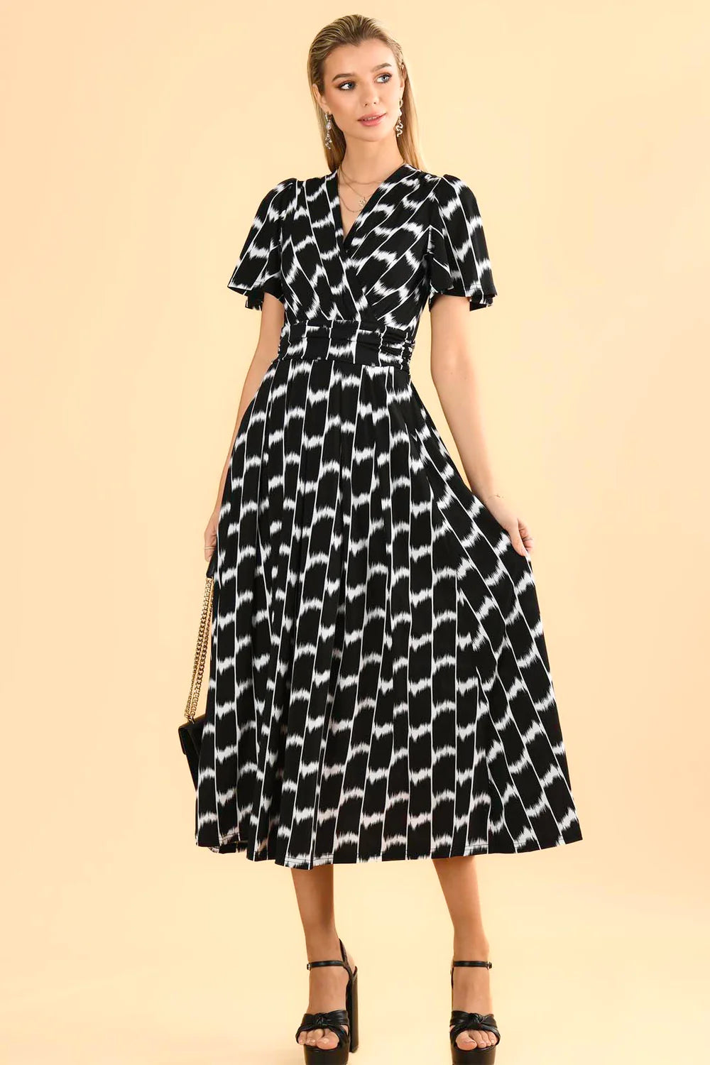 Major Savings casual slip dressHALLEY ANGLE SLEEVE JERSEY MAXI DRESS (BLACK GEO)